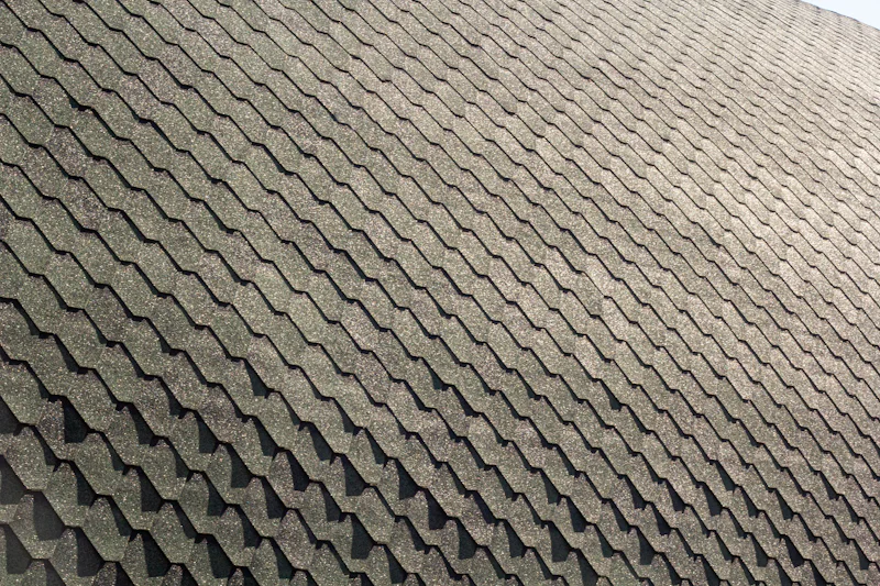 Close view of dark architectural shingles